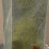 A close up of the corner of a vase