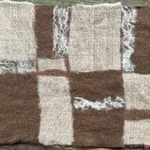 A close up of the brown and white squares