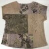 A piece of clothing with leaves and flowers on it.