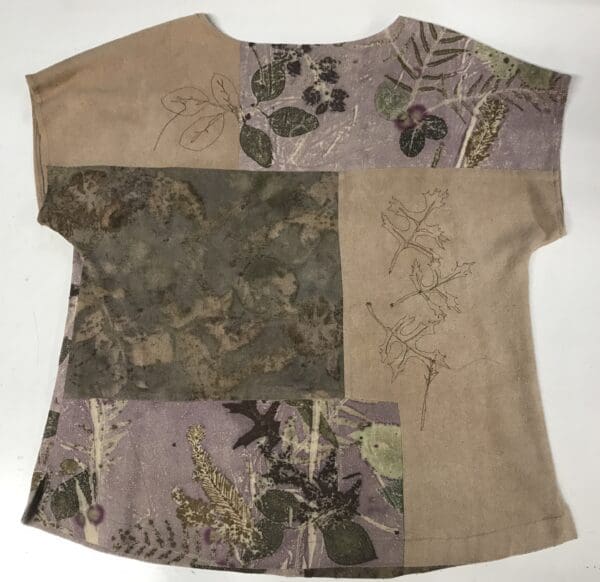 A piece of clothing with leaves and flowers on it.