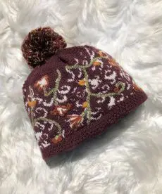 A hat with a flower design on it