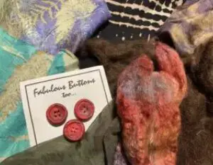 A close up of buttons on fabric