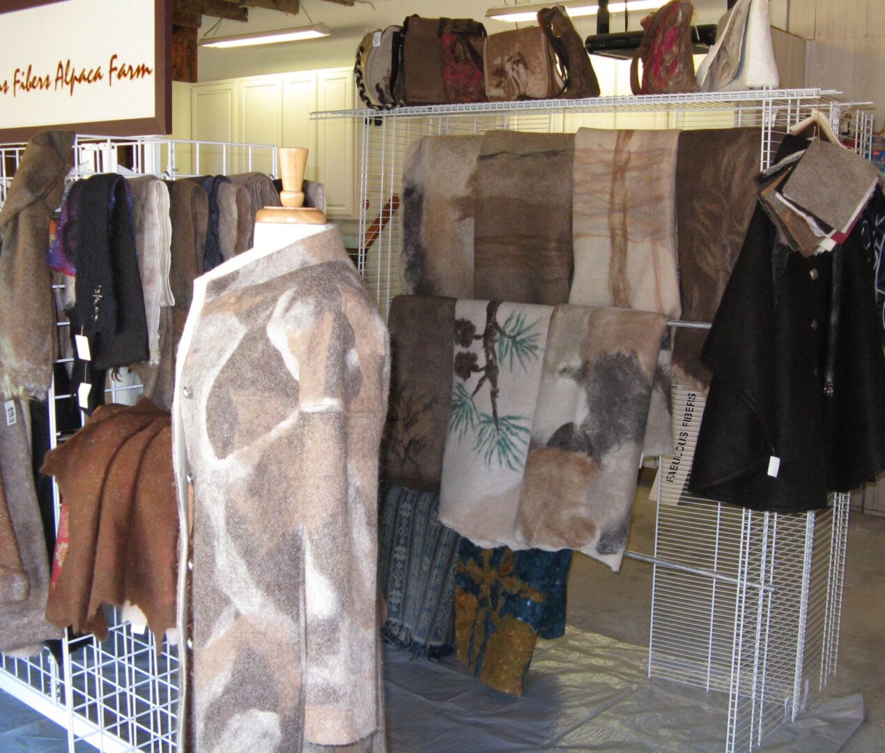 A room with many different types of clothing on display.