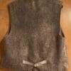 Brown wool vest back view.