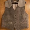 Men's brown wool vest with suede accents.