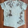 Eco-printed teal v-neck t-shirt.
