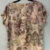 Eco-printed beige silk blouse, back view.
