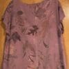 Mauve leaf-print top, back view.