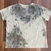 Beige t-shirt with botanical print.