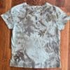 Eco-printed leaf design on tee shirt.