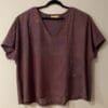 Purple short-sleeved linen top with dye.