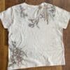 Pale pink t-shirt with botanical print.