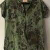Eco-printed green linen shirt.