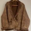 Brown wool jacket with tie belt.