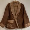 Brown wool jacket with beige accents.